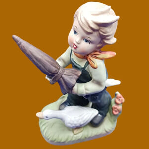 Napco boy with goose and umbrella "6"figurine